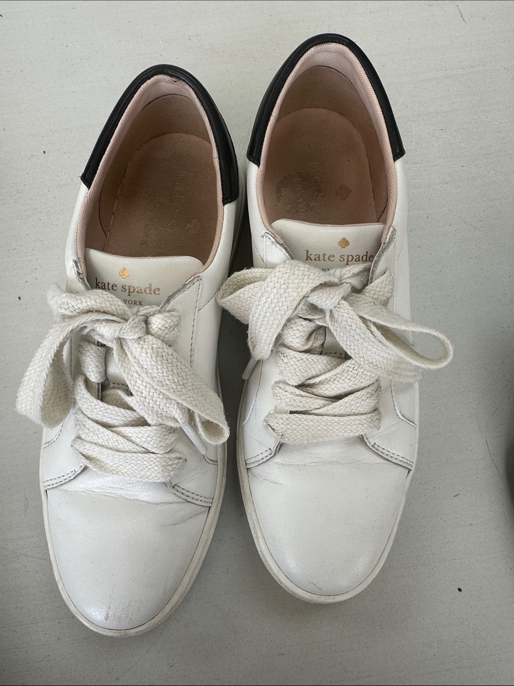 kate spade White Leather Sneakers with Black Heel Accent